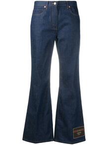 расклешенные джинсы с нашивкой-логотипом Gucci 156642055055