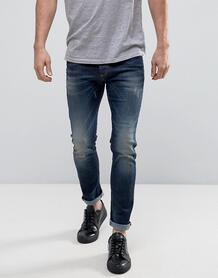 Выбеленные зауженные джинсы с потертостями United Colors of Benetton 958356