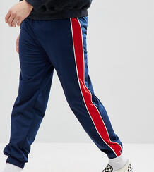 Темно-синие спортивные брюки с красными полосками Reclaimed Vintage In 1231254