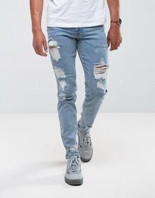 Светлые эластичные узкие джинсы с рваной отделкой ASOS - Синий ASOS DESIGN 1071495
