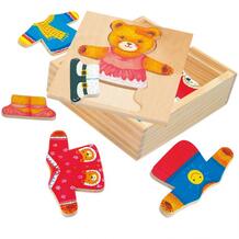 Деревянная игрушка Пазл Гардероб медведицы Bino 338245