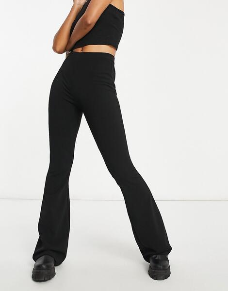 Расклешенные трикотажные брюки узкого кроя -Черный цвет ASOS DESIGN 10887362
