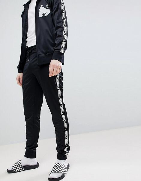 Черные спортивные штаны с контрастными полосками по бокам Money 1281106